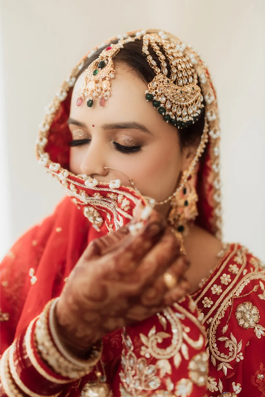 Bridal portrait with traditional mathapatti and jewellery by Studio Simbal Photography, best wedding photographer in Punjab